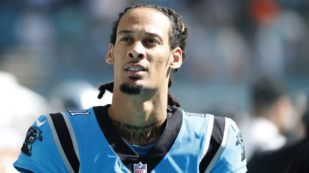 Robby Anderson, #11 of the Carolina Panthers, looks on before the game against the Miami Dolphins at Hard Rock Stadium on November 28, 2021 in Miami Gardens, Florida.